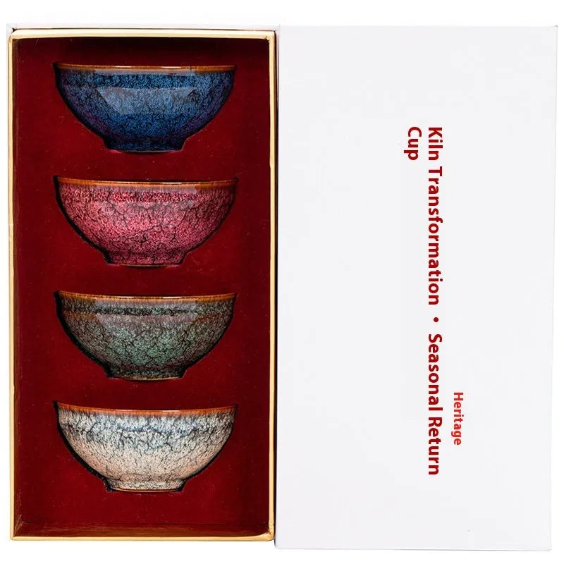Ceramic Kung Fu tea cup set with four cups in a light-coloured new Chinese style gift box.