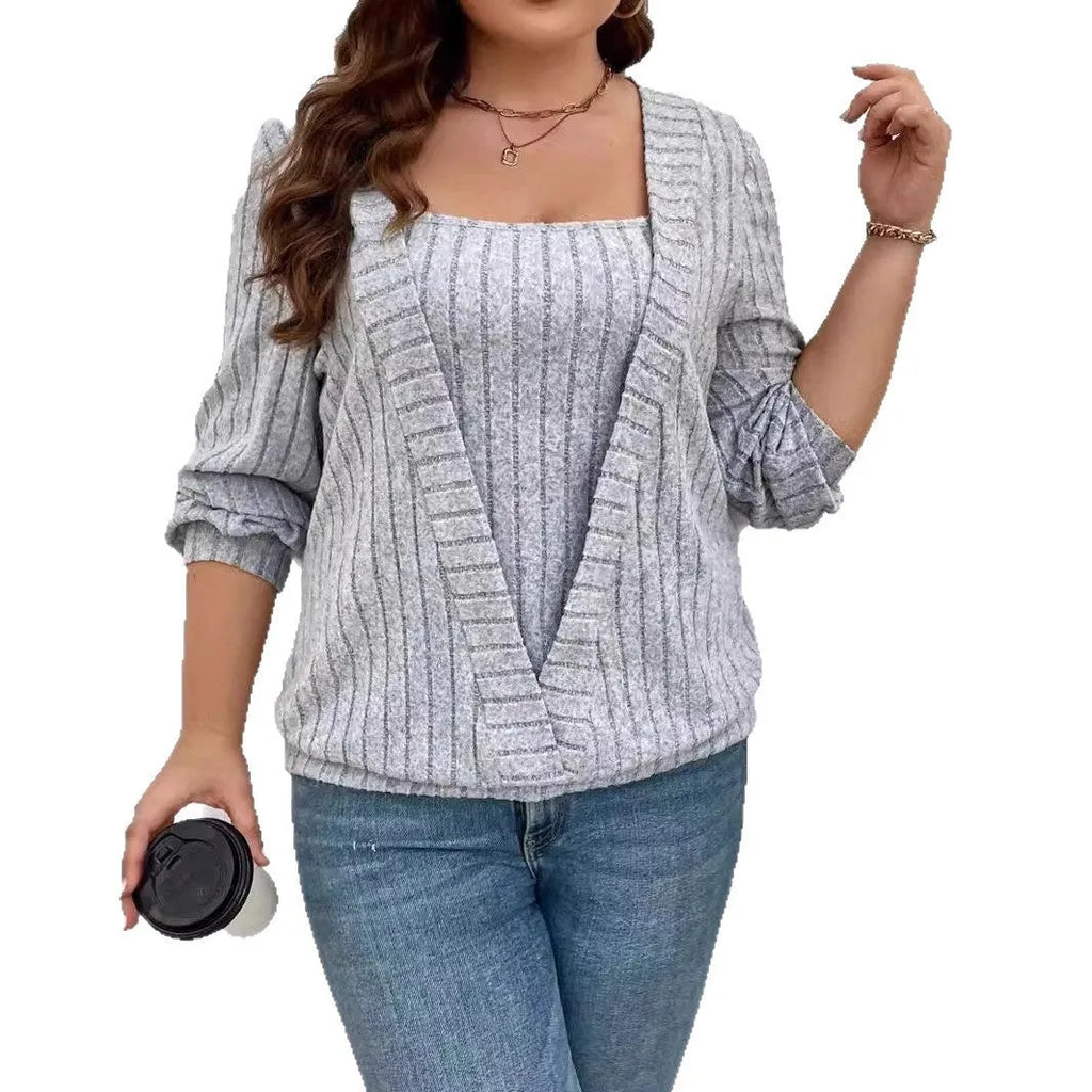Solid colour rib knit V-neck long sleeve top, part of a false two-piece suit, shown in a loose fit.