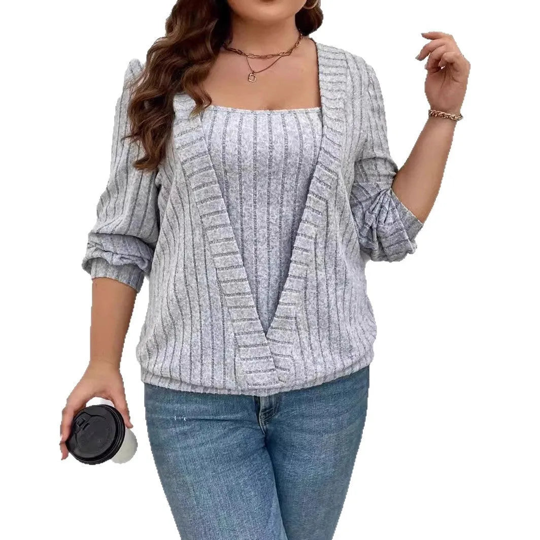 Solid colour rib knit V-neck long sleeve top, part of a false two-piece suit, shown in a loose fit.