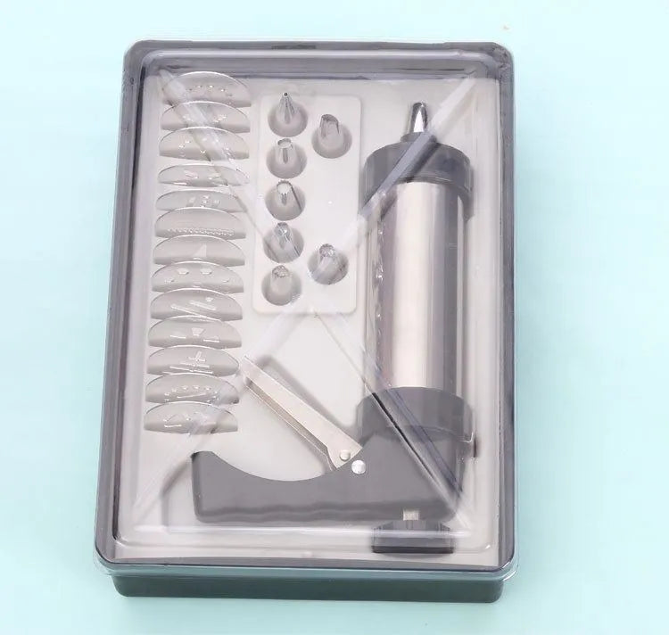 Stainless steel biscuit press cookie gun with assortment of metal cookie molds and piping nozzles