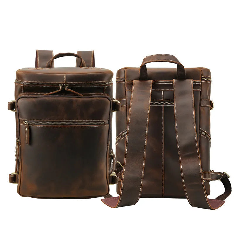 Large brown leather backpack with zipper closure, under 20L capacity