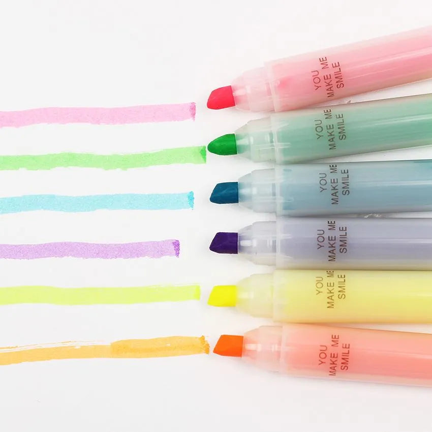 Six highlighter pens with slanted oblique shape in plastic casing showing different colours
