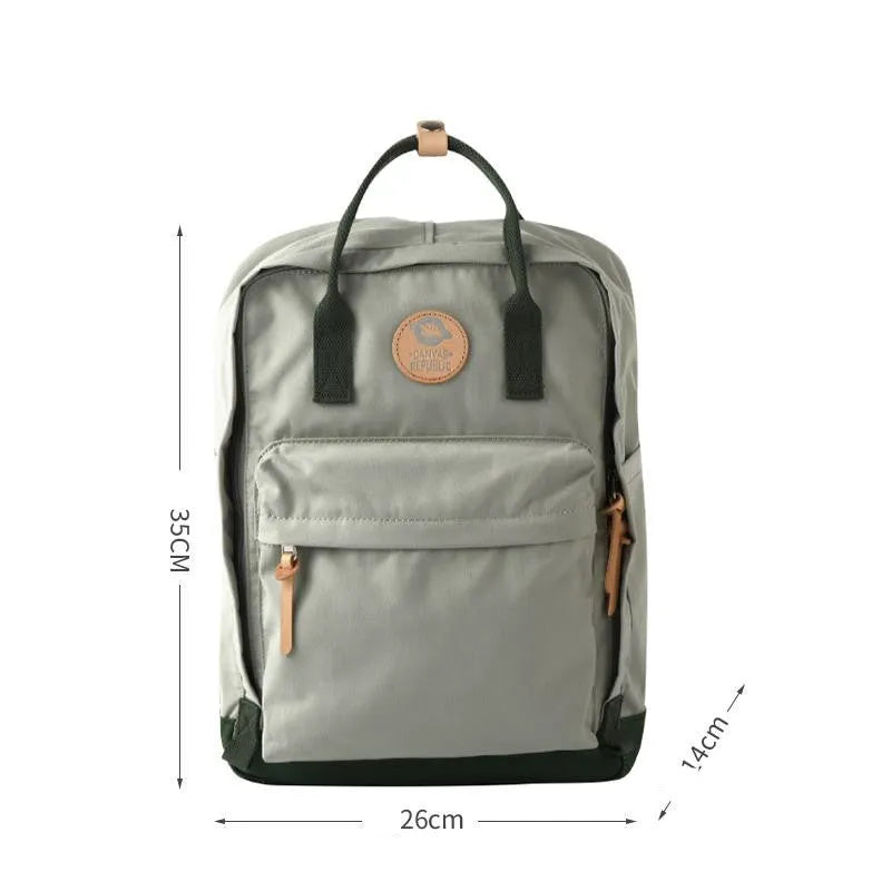 Polyester backpack with water repellent finish, zipper closure, and computer pocket, available in hit colours