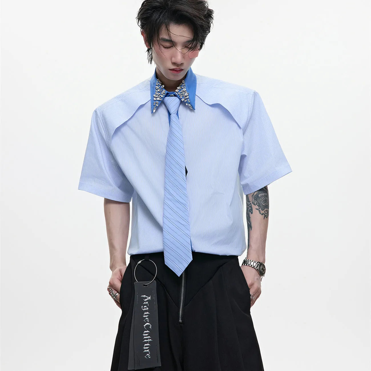 Men's blue patchwork striped shirt with diamond tie detail, loose fit, and button-down collar