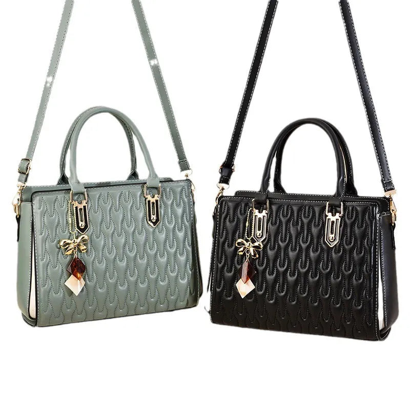 Women's simple shoulder messenger bag in black polyester with large capacity and internal pockets.