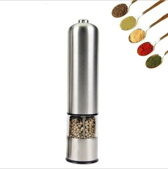 Stainless steel electric pepper grinder on kitchen counter