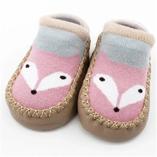 Baby floor socks with anti-slip sole in combed cotton fabric, showing colour and pattern options