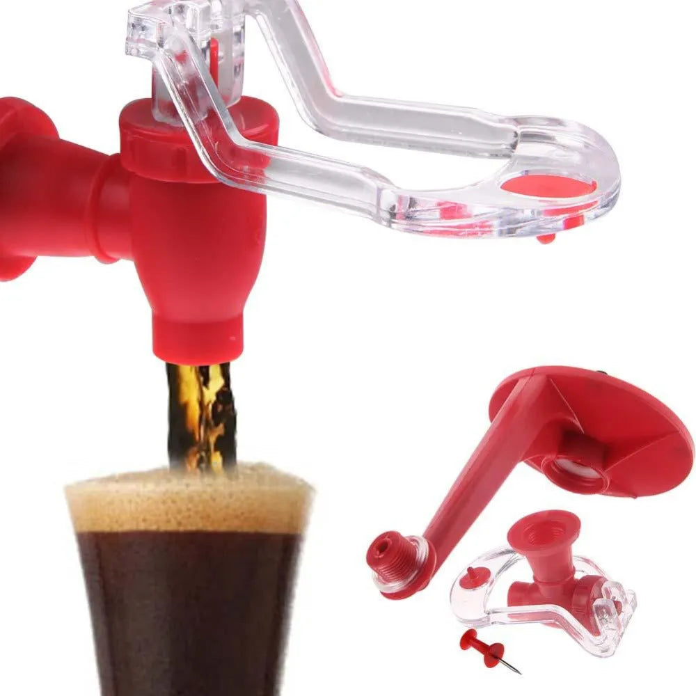 Red Magic Tap plastic soda dispenser attached to an inverted 2-litre bottle on a table.