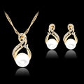 Gold tone pearl necklace and earrings set on display showing CA410-A colour with diamond-cut alloy finish