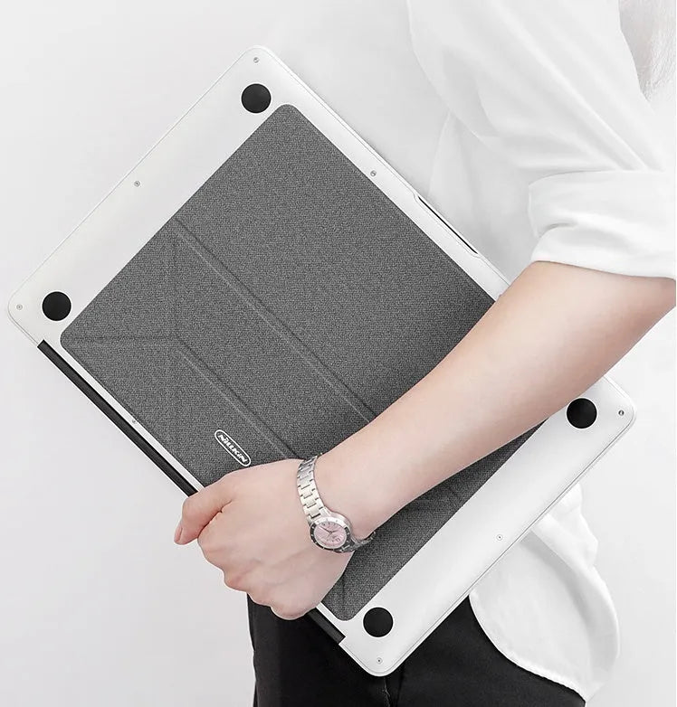 Blue foldable laptop cooling stand with non-slip surface shown open and closed, next to a 15-inch notebook.