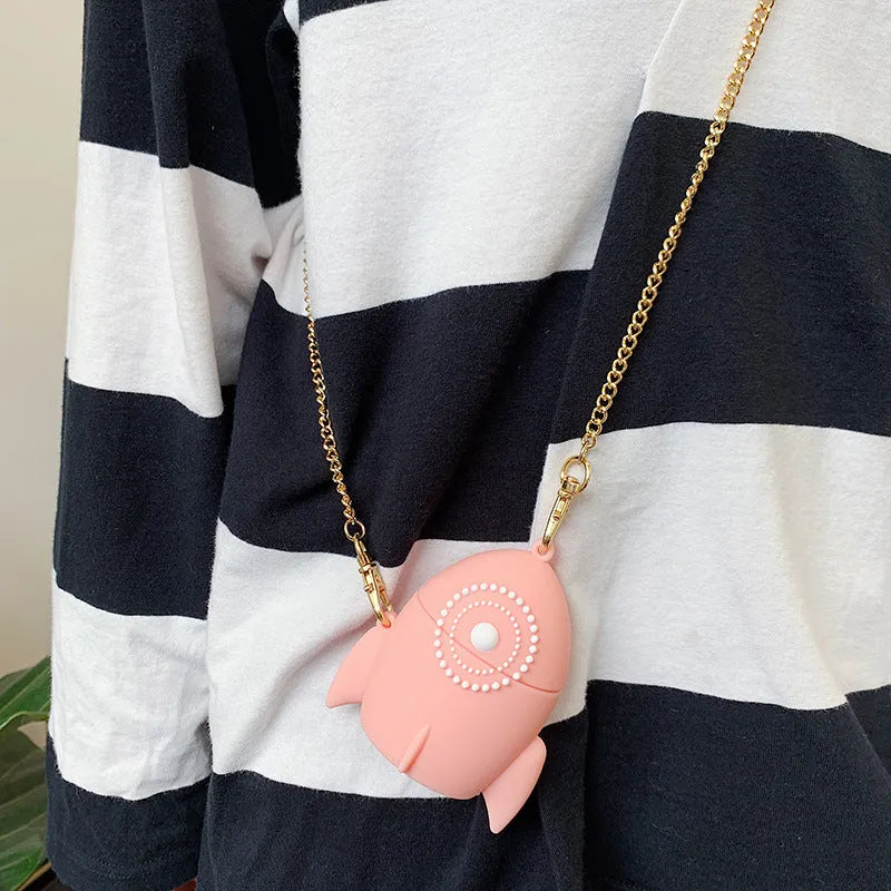 Pink silicone protective case on an AirPods wireless charging case.