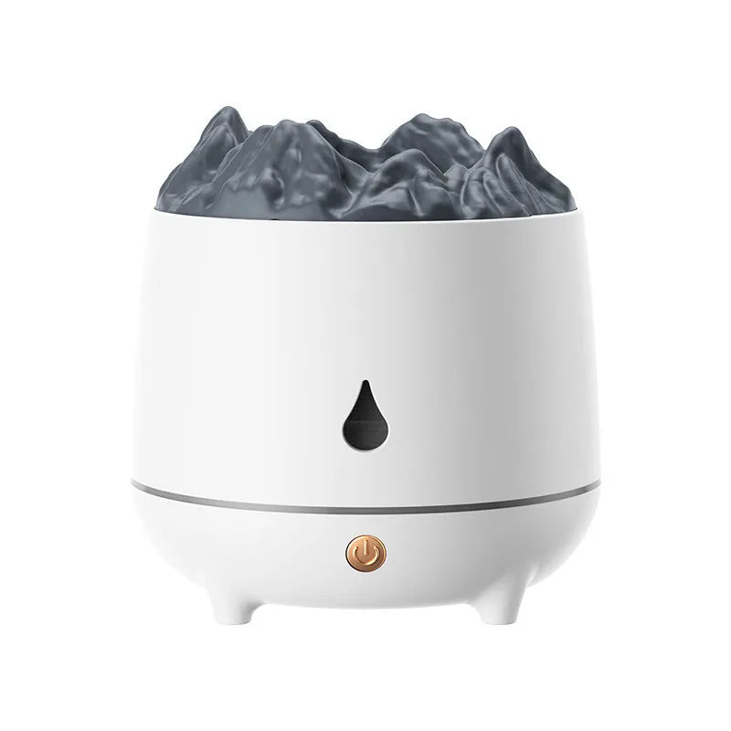 White volcano-shaped ultrasonic humidifier with USB cable on a table