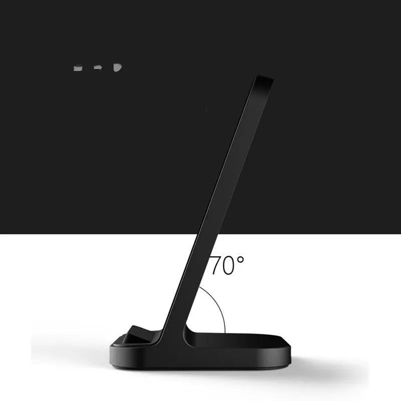 Dark grey vertical wireless charging stand for Apple phones on desktop