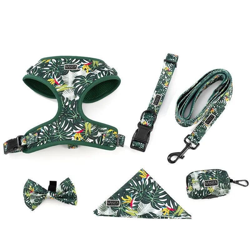 Adjustable cloth dog harness set with leash, collar, poop bag, bow, and bandana in various colours.