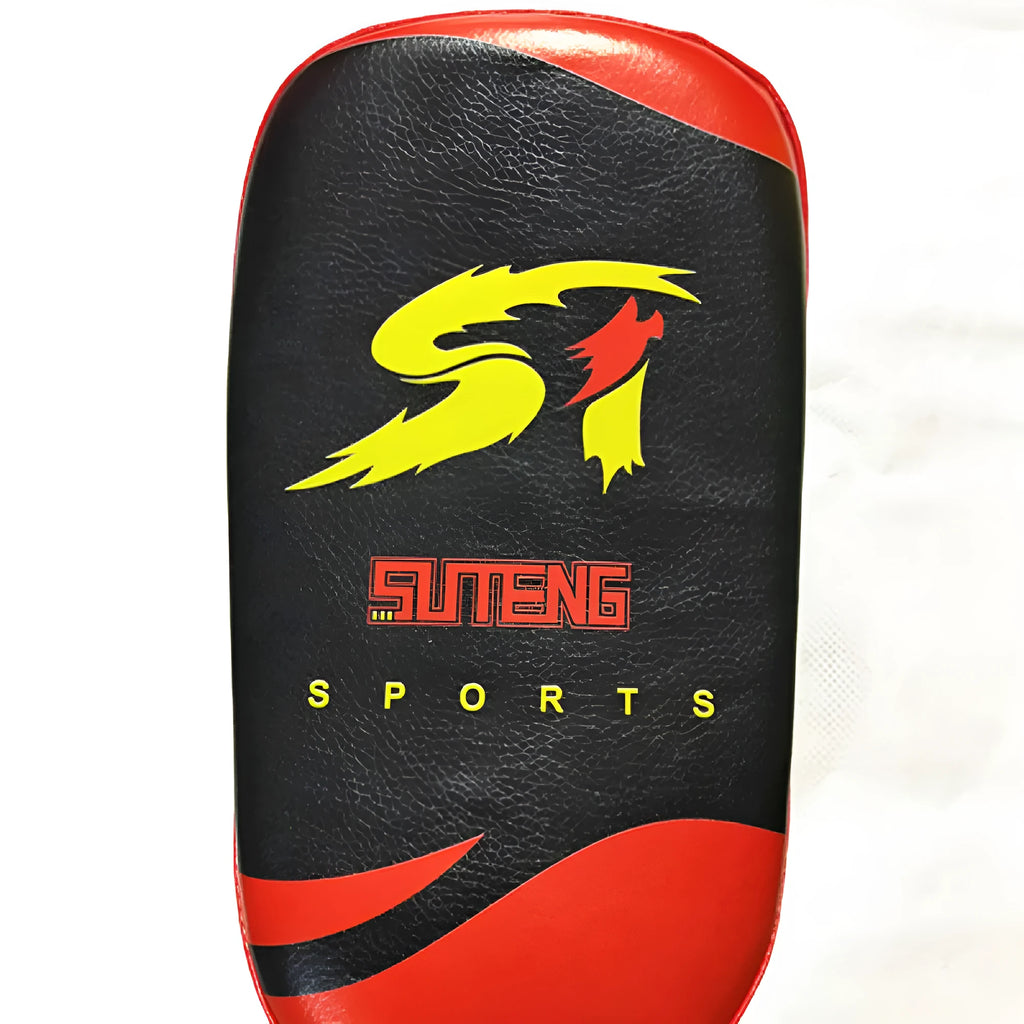 Black and red square hand-held boxing foot target pad with a rear buckle.
