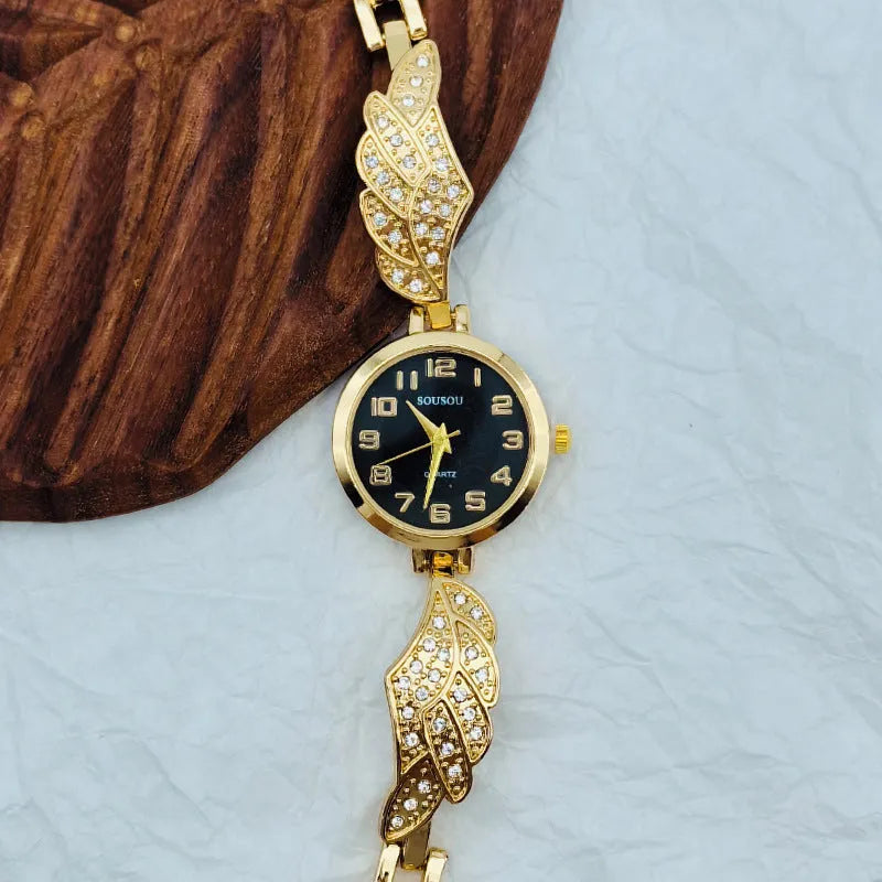 Women's stainless steel watch with round dial and 9mm thickness showing gold face option