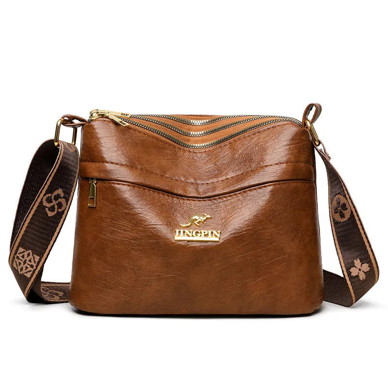 Brown PU messenger bag with multiple compartments and cross body strap