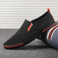 Men's casual canvas sneakers in grey, black orange, and khaki with vulcanised rubber soles