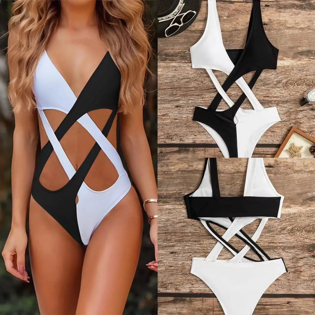 White women's one-piece swimsuit with colour-block panels and hollow-out design details.