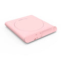 Pink and white USB-powered heating cup pad with mechanical timer control for keeping mugs warm.