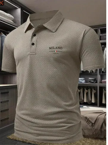Men's loose fit short-sleeved lapel polo shirt in a solid colour on a model.