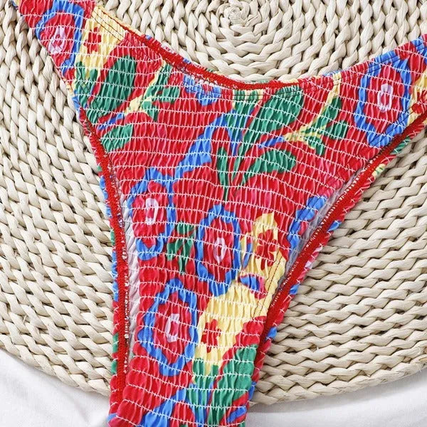 Red floral print women's two-piece underwire bikini set on a white background