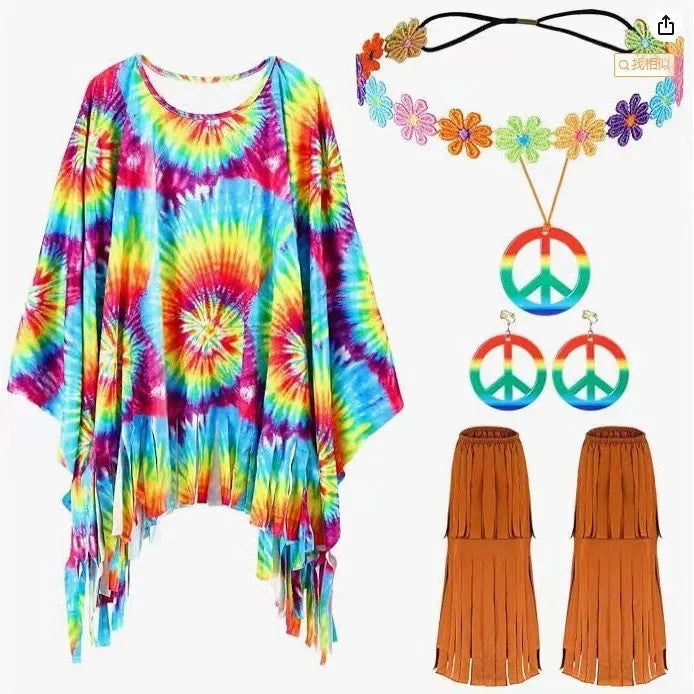 Person wearing a vibrant rainbow tie-dye sleeveless cloak with large bell sleeves at a festival.