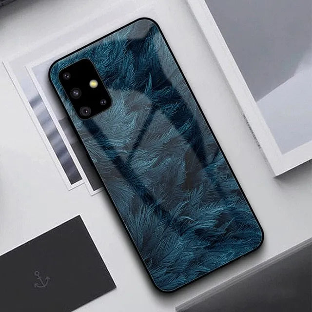 Black silicone phone case for Samsung Galaxy and Apple iPhone models on white background