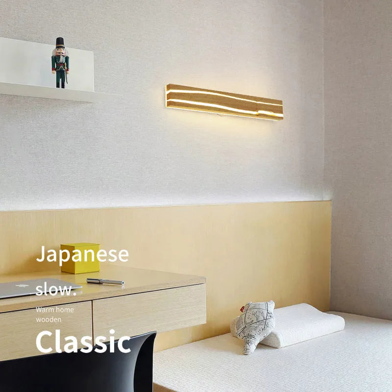 Solid wood LED wall light in log colour with rubber wood frame and acrylic panel