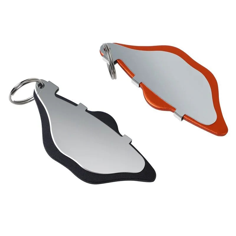 Mountain bike disc brake pad replacement set in black and orange colours with metal construction.