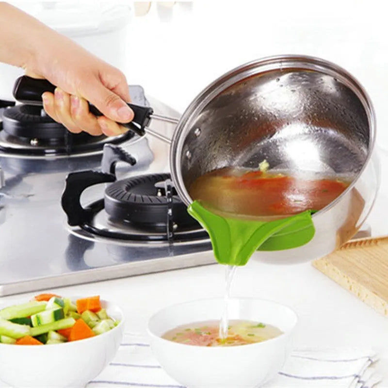 Green silicone soup funnel kitchen gadget showing flexible food-grade material and clip-on design