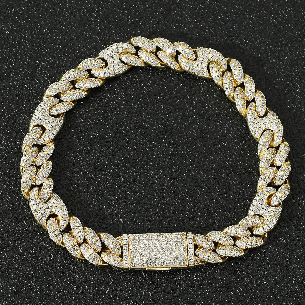 Gold copper Cuban chain bracelet with micro inlaid zircon on a surface