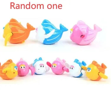 Plastic baby tortoise bath toy floating in water for infant bath time play