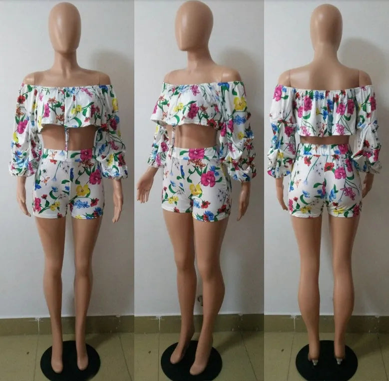 Multicolour digitally printed two-piece outfit with fluffy long sleeves and shorts.