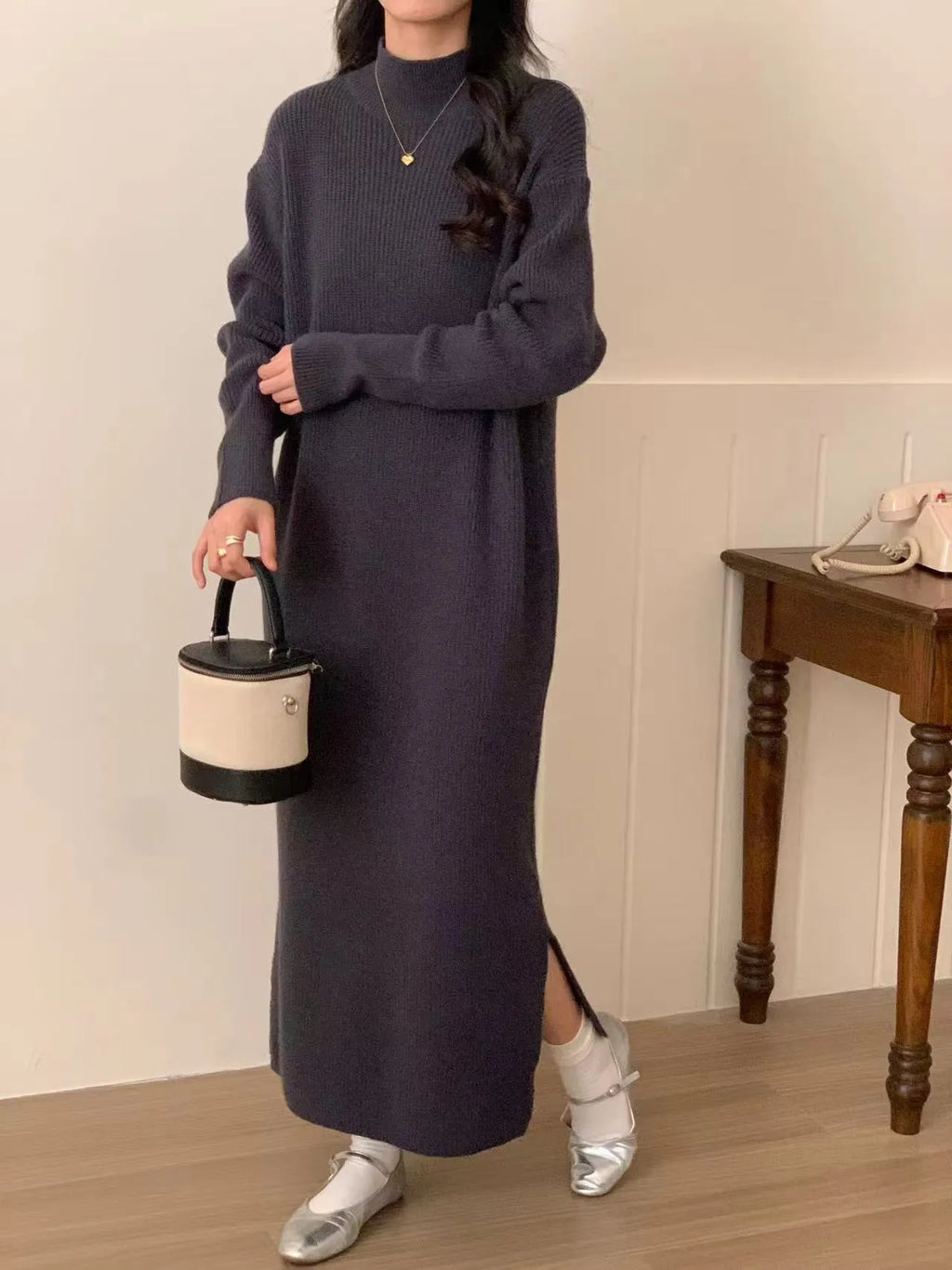 Women's acrylic half turtleneck knitted dress in graphite colour with long sleeves and mid-length hem