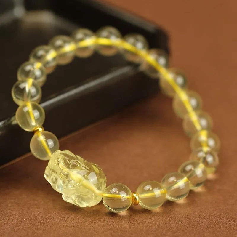 Yellow leather Pi Xiu bracelet with artificial crystal beads in Chinese simple national style