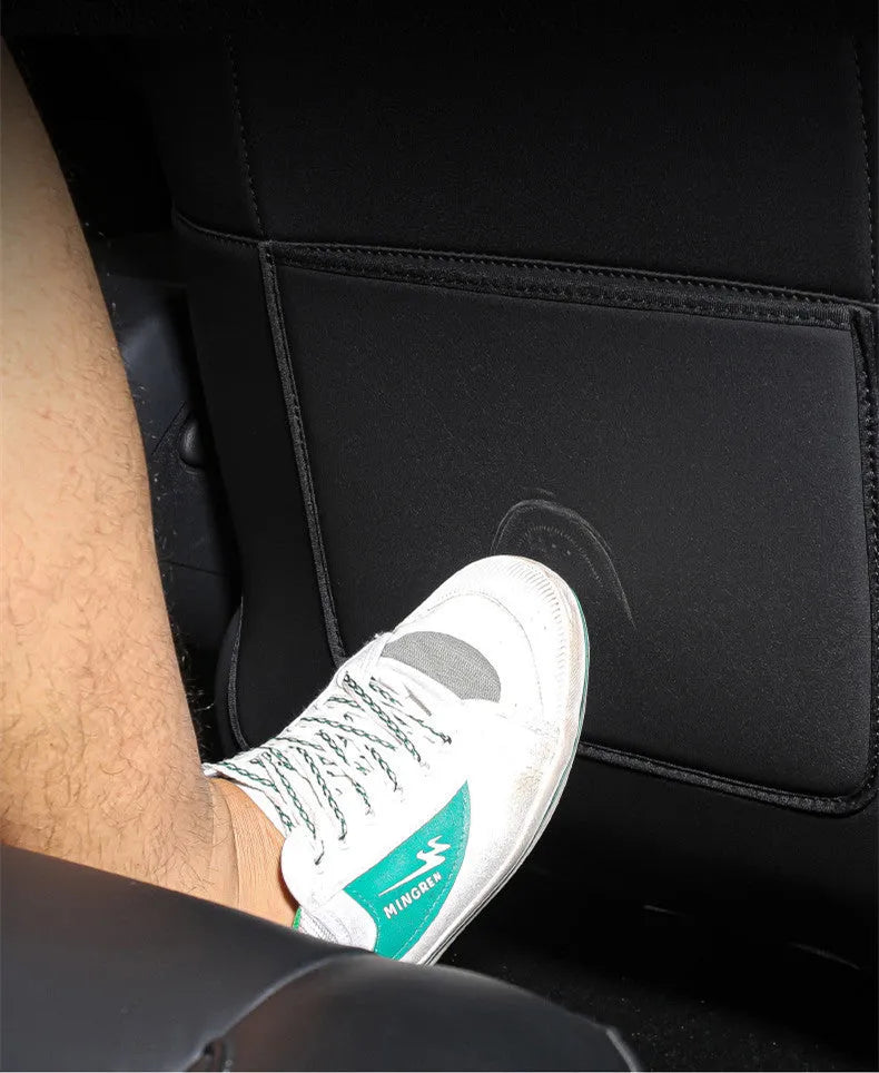 Black leather rear anti kick pad car seat protector measuring 68cm by 42cm