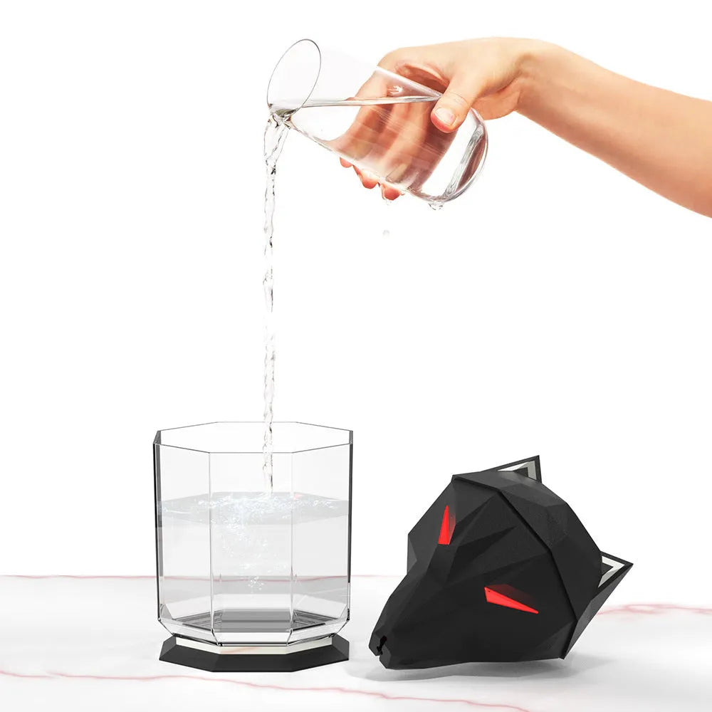 War Wolf ultrasonic air humidifier with colourful LED lights on desktop next to USB cable
