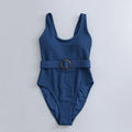 Navy blue women's one-piece swimsuit with triangle neckline, slim fit, and sleeveless design.