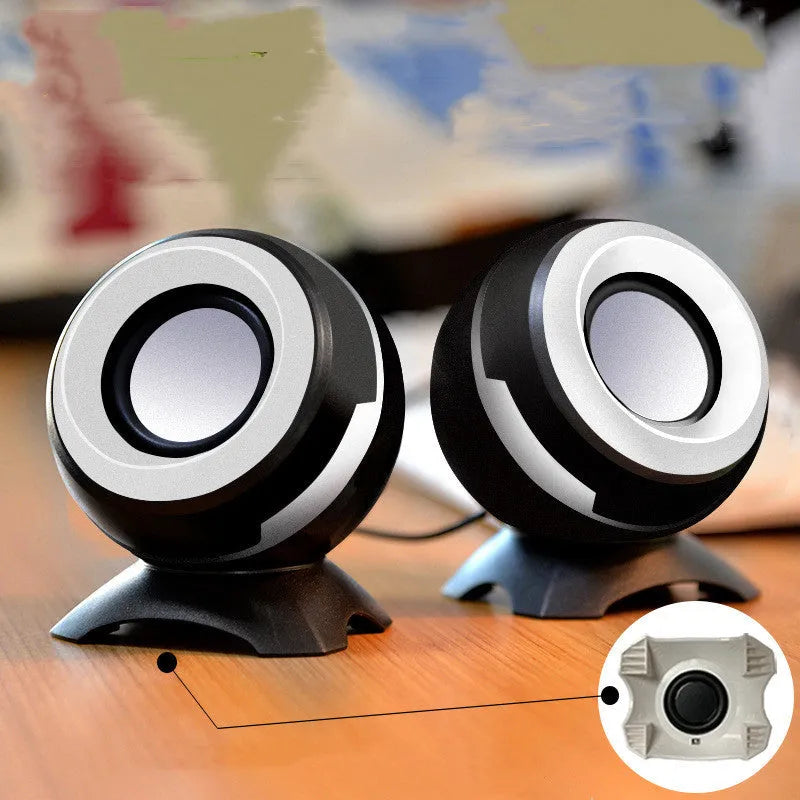 Compact black and gold USB desktop speakers for laptop computers with audio cable