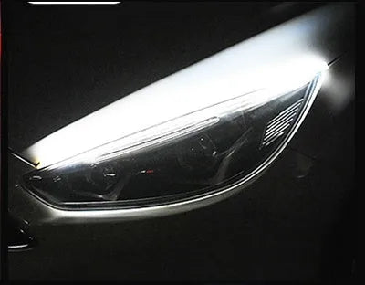 Waterproof silicone car LED daytime running light and flowing turn signal strip in multiple colours.
