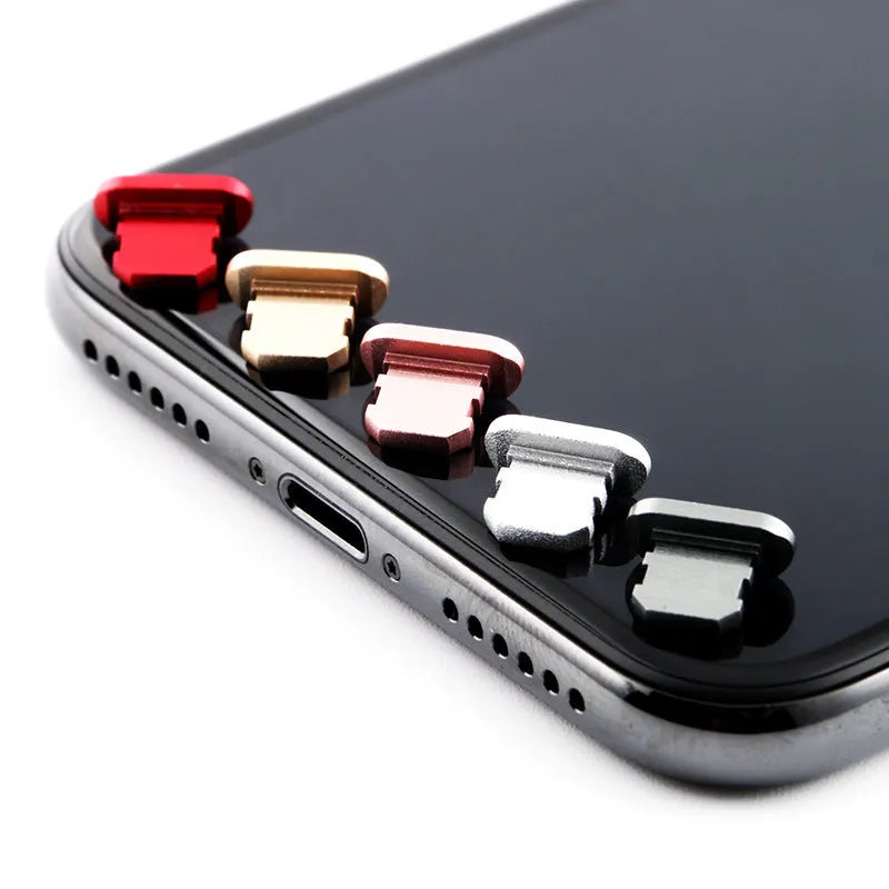 Aluminium alloy dust plug for iPhone Lightning charging port in various metallic colours.