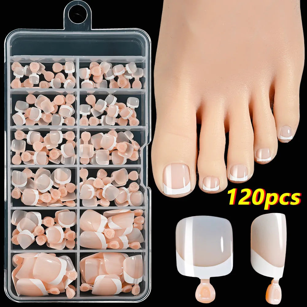 120-piece box of French white edge full square short acrylic nail tips in nine nude colours.