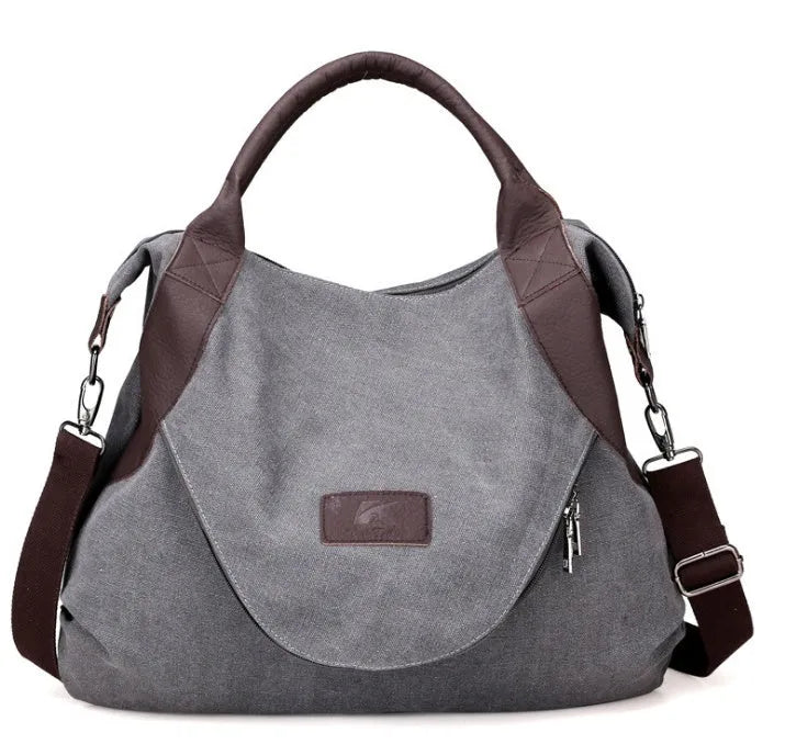 Retro minimalist canvas handbag for women with zipper closure and double straps