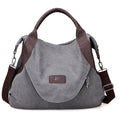 Retro minimalist canvas handbag for women with zipper closure and double straps