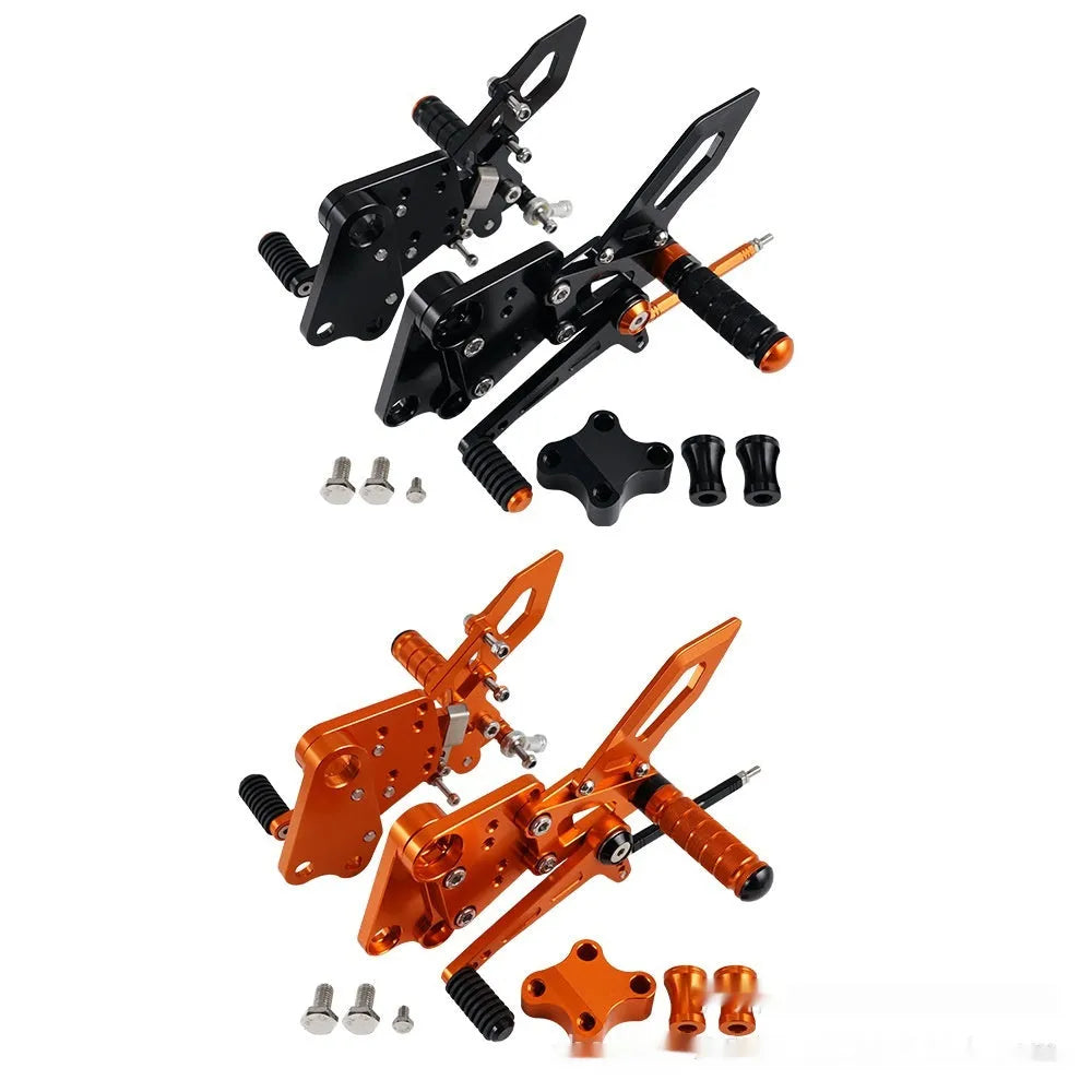Black and orange KTM DUKE motorcycle footpeg bracket assembly for 125 200 250 390 models