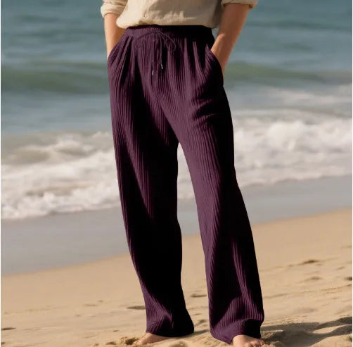Men's baggy straight trousers in solid colour with drawstring waist, polyester blend fabric, casual style