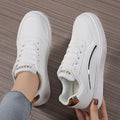 Breathable unisex low tube sneakers in platinum and black gold, sizes 35-42, non-slip rubber outsole