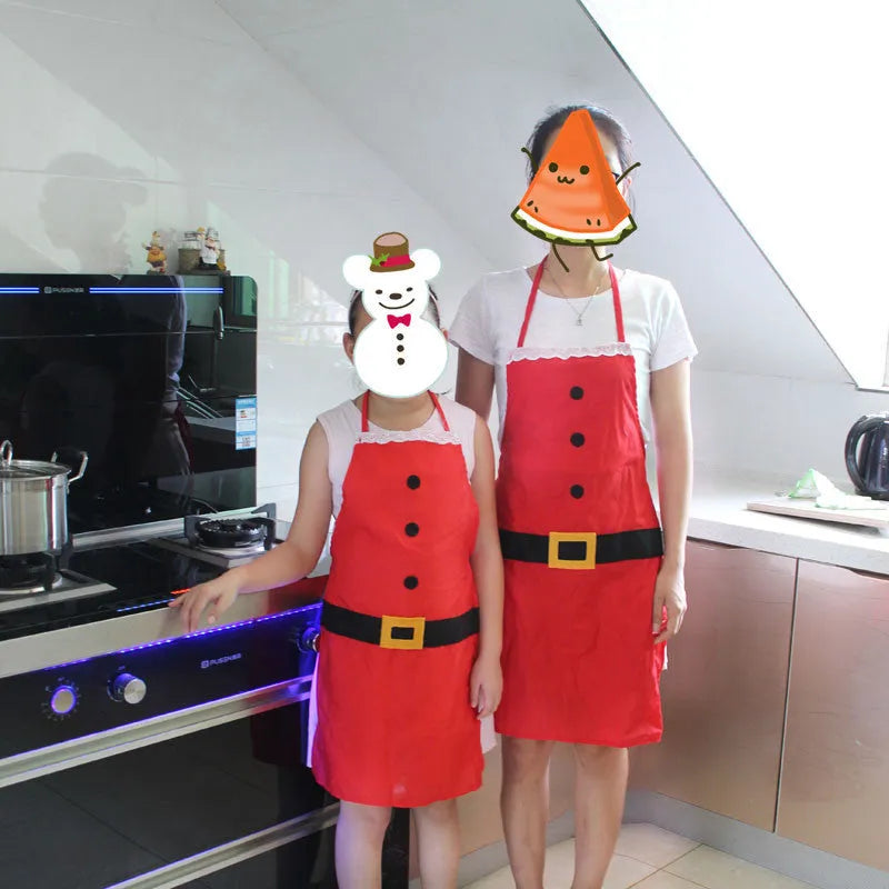 Red Merry Christmas apron in adult and children's sizes with adjustable straps