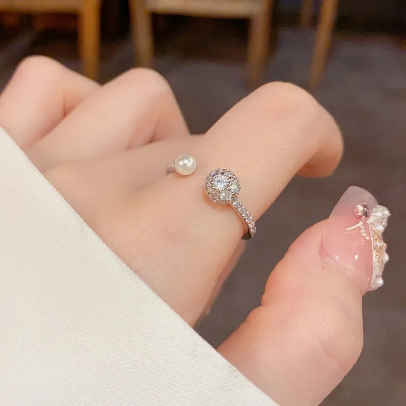 Round zircon open-end ring with gold plating on copper in gold or silver colour